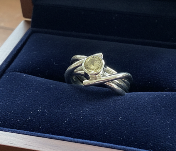 Citrine Ring with Distinctive intertwined sterling silver band