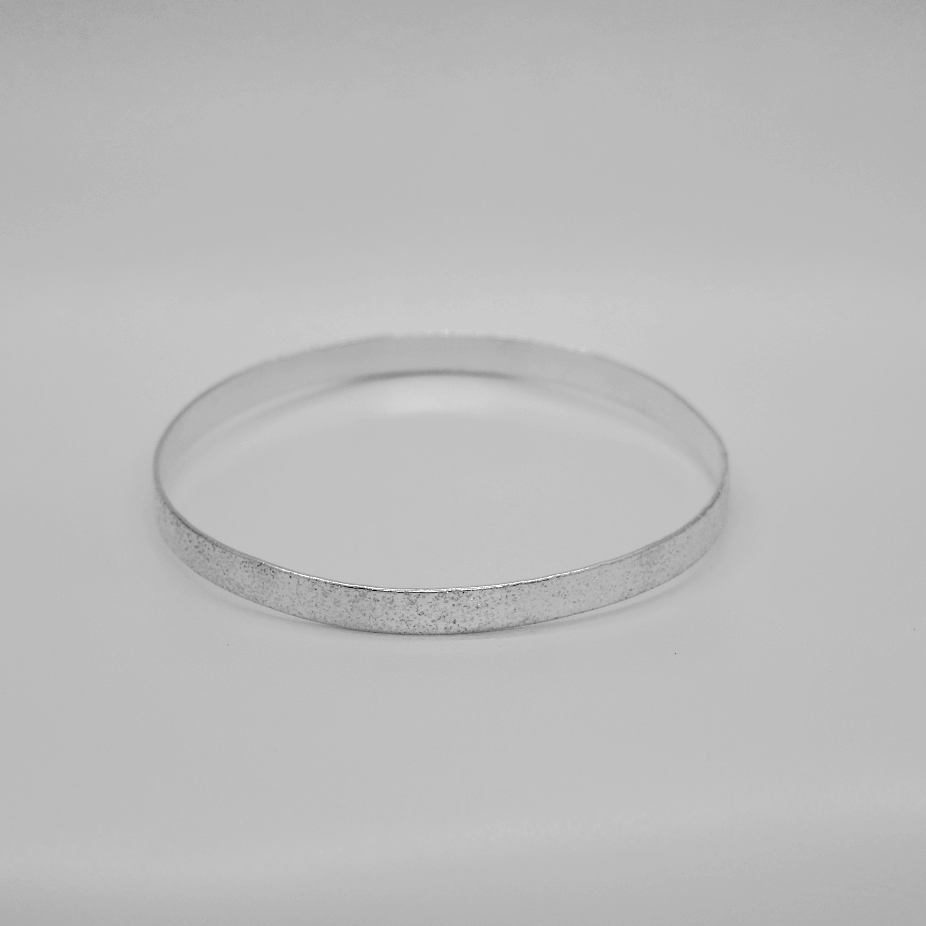 Wide Sand Embossed Sterling Silver Bangle