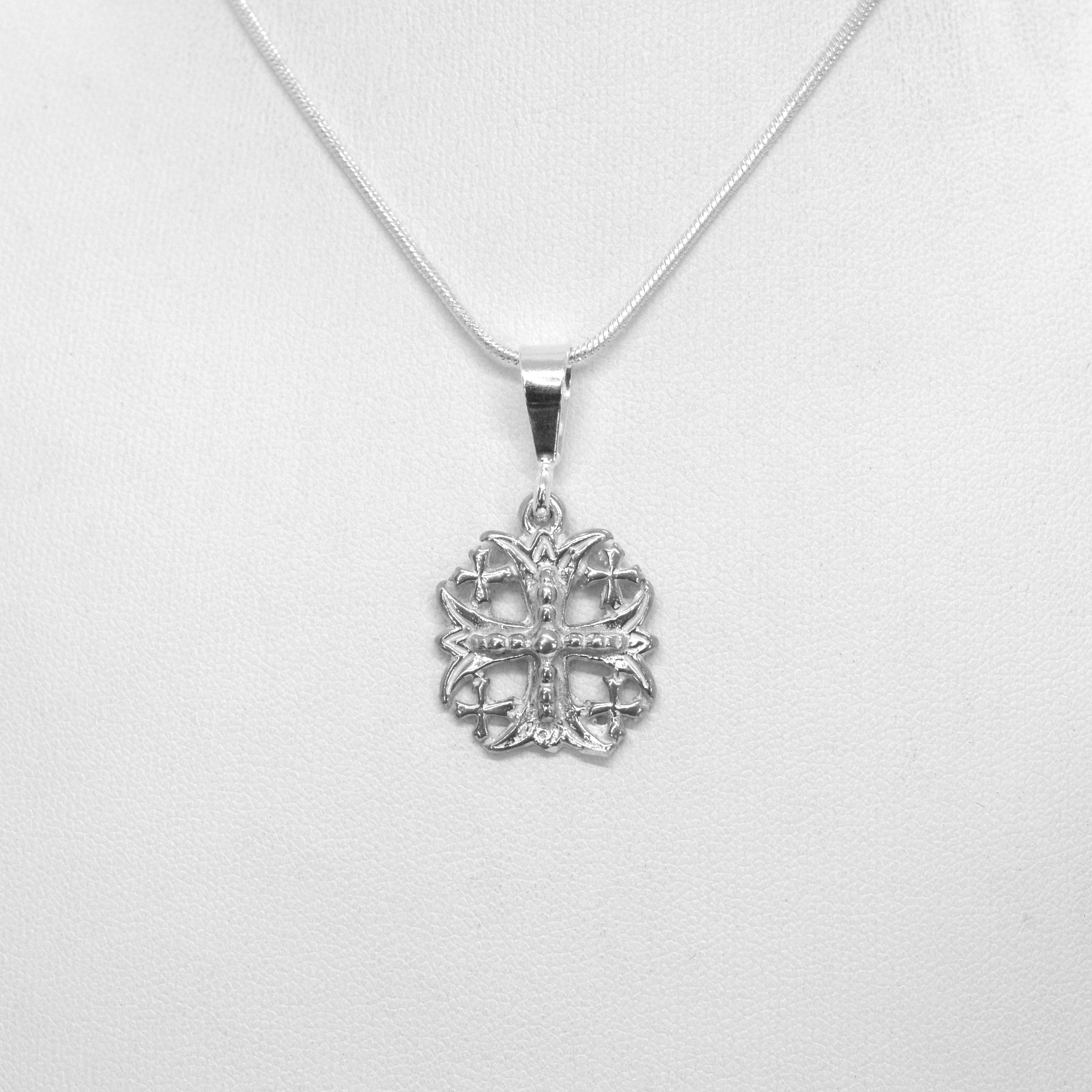 Ornate cross pendant