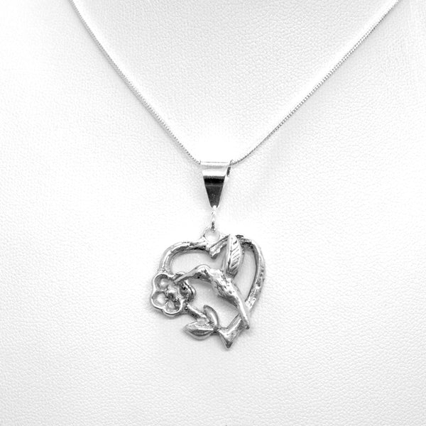 Hummingbird heart pendant