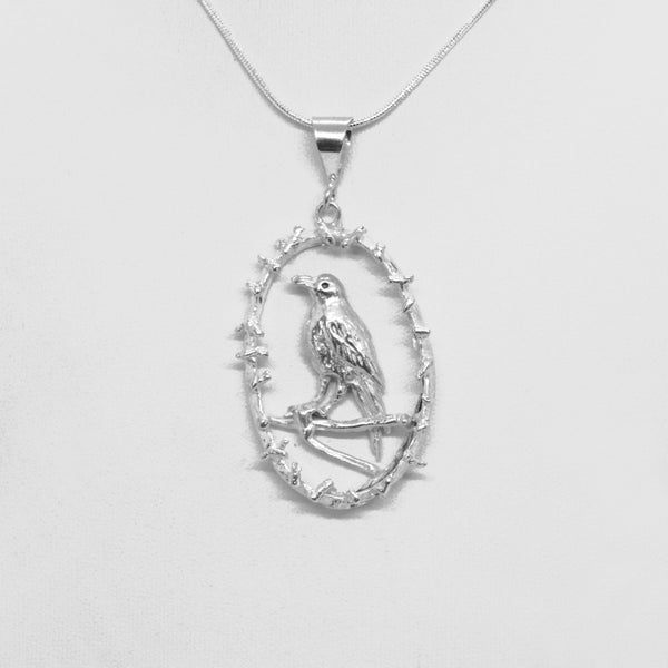 Raven in Oval Pendant